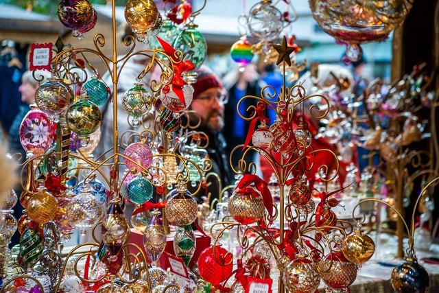 Market stalls sold many Christmas items, including beautifully crafted Christmas tree decorations.