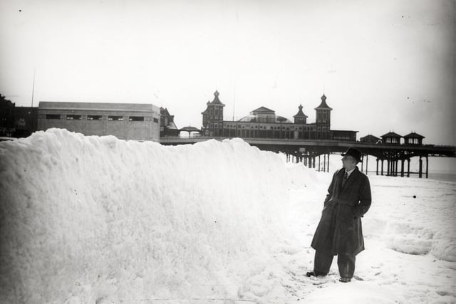 We hardly see these kinds of scenes nowadays - snow piled high on the beach in Blackpool, 1963.Clive Joyner remembers being on the beach and the surf had frozen
