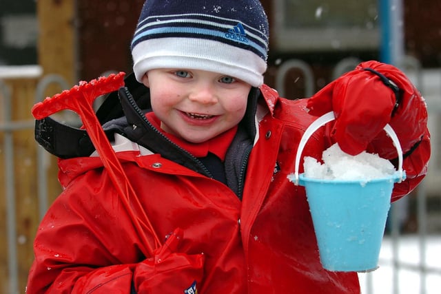 Revoe reception class children in the snow, 2010. Pictured is Cole Bradwell.