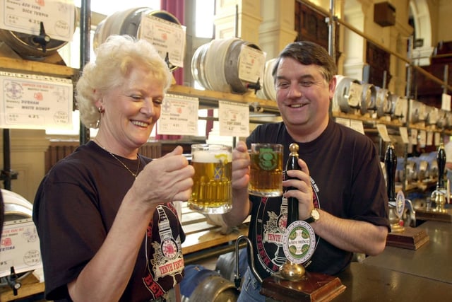 Tasting the beer before the opening of the Wakefield Beer Festival at the Town Hall in October 2000 are chairman George Denton and staffing officer Maureen Waller. More than 116 beers were on sale from 50 different brewers.