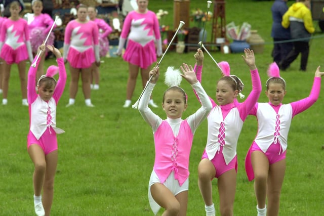 Concentration on the faces of the Horbury Pink Ladies Majorettes performing in the main arena of the Country Show at Nostell Priory in July 2000.