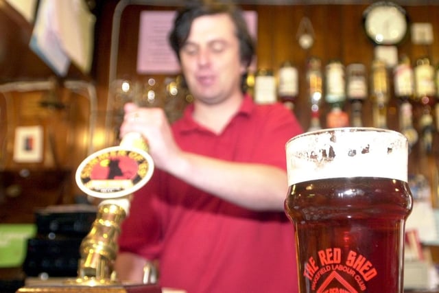 Richard Council, vice president of the Labour Club, pulls a pint at the Red Shed named by CAMRA as Britain's Best Real Ale Club.