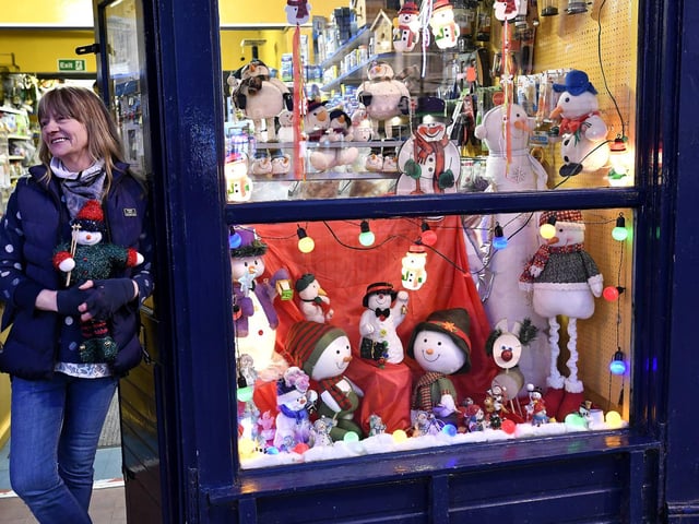 Sue White at the door of Falsgrave Pet Shop
