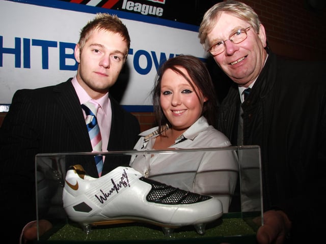 A football boot signed by Wayne Rooney will be auctioned for Help for Heroes.