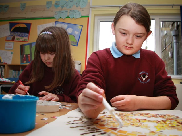 Goathland School pupils Emily Thompson and Jasmine Davy work on a project.