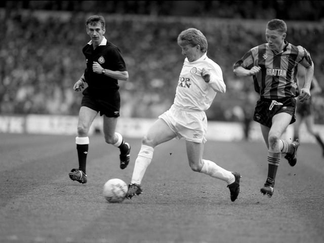 Gordon Strachan drives through the heart of midfield.