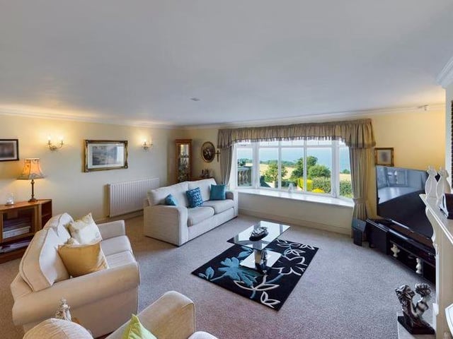 The comfortable lounge, with feature fireplace