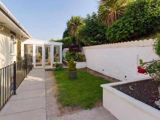 A look outside, at the property's surrounding greenery.
