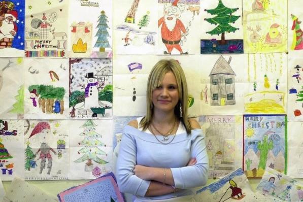 Kathryn, of Thornes, Wakefield, looking at some of the Christmas drawings by children which were on display at the Wakefield Art Gallery, Wakefield in January 2004.