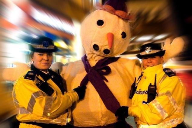 Police Community Support Officers join in the fun at the Wakefield christmas lights switch on in 2005. From left: Helen, Snowy the snowman and Vicky.