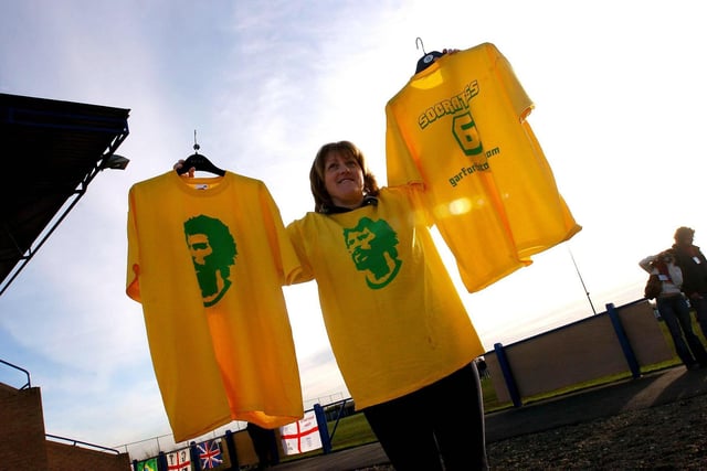 Socrates t-shirts are sold outside Wheatley Park ahead of his debut.