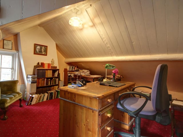 This triangular shaped room makes a wonderful study, but could equally be converted back to a bedroom.