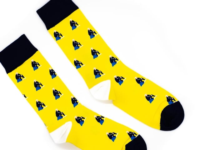 You'll be sure to turn heads with these striking socks featuring El Loco and his favourite blue bucket.
Available to buy at https://sockcouncil.com/product/el-loco-socks/