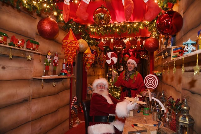 Father Christmas and Tinsel the elf at Santa's grotto at the Crown Hotel