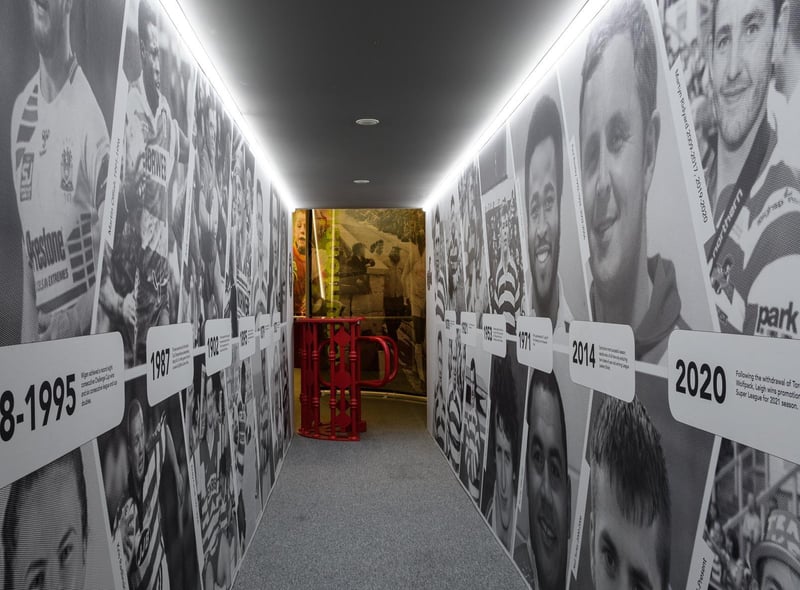 The exhibition begins with a tunnel full of famous faces throughout history