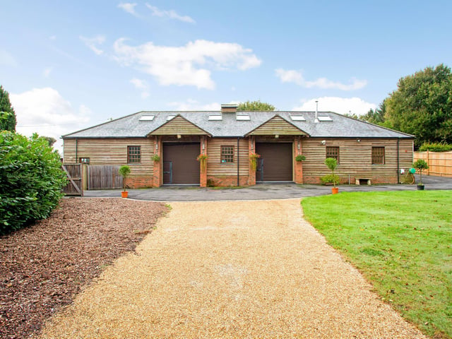 The building that awaits development, but already carries planning permission for conversion to a superior style home.