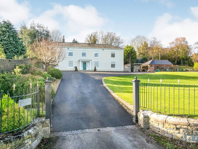 A grand front entrance to this stunning Welsh property that is for sale with a price tag of £1,225,000.
