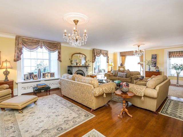 Natural light floods in through the many windows of this elegant and immaculate Welsh home.