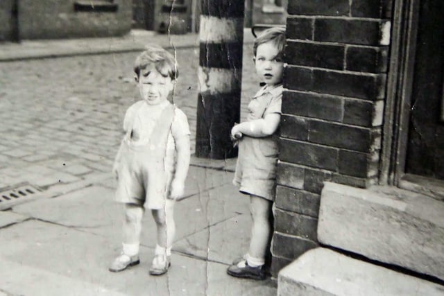 This undated photo shows two small boys, Martin Bridge, aged about 3, and Robert Bridge (who supplied the image) aged about 2, possibly taken on the corner of Whingate Road and Albany Street in Wotley. But it may have been one of the other streets in that area. Can anyone confirm this?