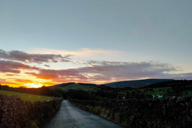This sunset was sent in by Simone Clarke looking down Pasture Lane towards Roughlee.
