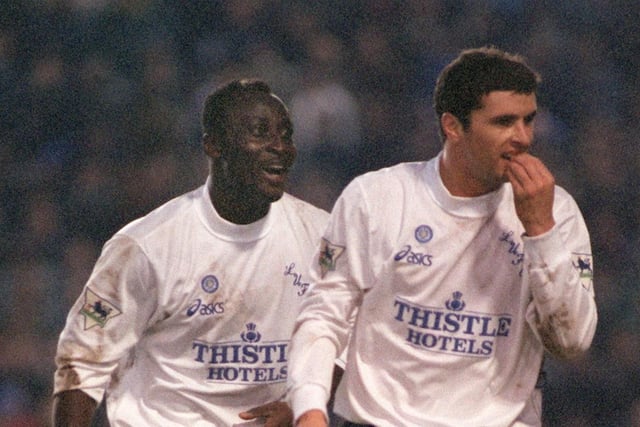 Speed with Tony Yeboah after the striker drew Leeds level in the second leg of the Whites' League Cup semi-final victory over Birmingham City in February 1996.