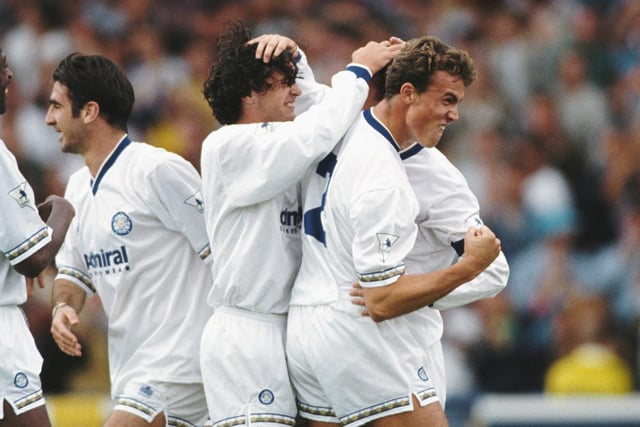 Speed and Jon Newsome celebrate with goalscorer Gary McAllister after the Scot put the Whites ahead seven minutes into a Premier League tie with Liverpool at the beginning of their 1992/1993 title defence. The game ended 2-2.