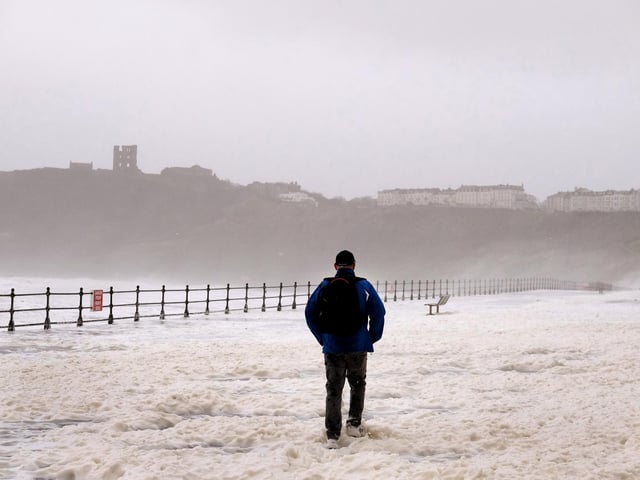 Royal Albert Drive is blanketed in sea foam.