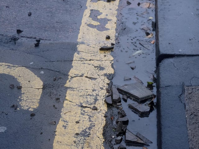 Roof tiles and debris from properties smashes on Dean Road.