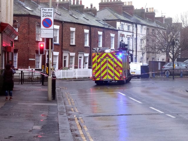 North Yorkshire Fire and Rescue Service cordon of part of Victoria Road due to falling debris from nearby buildings.