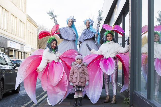 Brighouse BID bring winter wonderland fairies into Brighouse town centre. Nora Williams, four, with, from the left, Rebekah Lee, Natalie Farrell, Kimberley Russell,  and Kirsten Middleton.