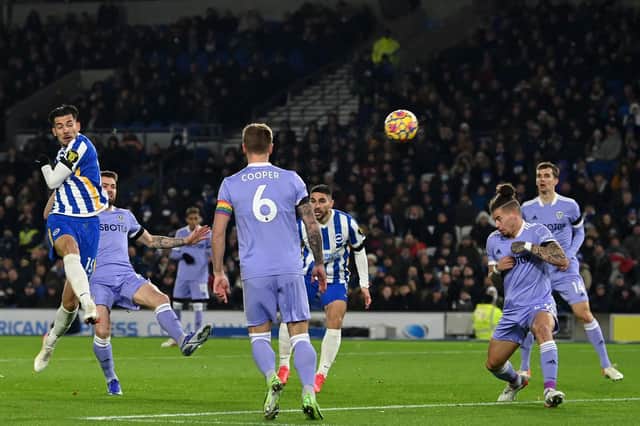 ANOTHER CHANCE: Brighton's Jakub Moder, left, fires one of a host of Seagulls opportunities over the crossbar. Photo by GLYN KIRK/AFP via Getty Images.