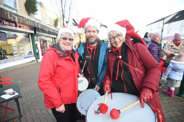 Chris Aveyard, Jon Aveyard and Sigrid Pach from Worldwise Samba Drummers, who performed at the market.