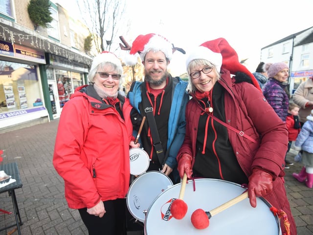 Chris Aveyard, Jon Aveyard and Sigrid Pach from Worldwise Samba Drummers, who performed at the market.