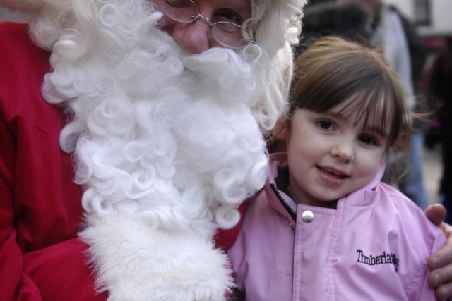 Olivia Jackson-Ives with Father Christmas at Knaresborough Christmas Market.
