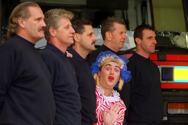 Firefighter Gary Holmes, who was playing the ugly sister in the Yeadon Panto with some of his colleagues at Rawdon Fire Station. He is pictured with, from left, Keith Gale, Barry Whitaker, David Millington, Bob Feather and Ian Dorman.