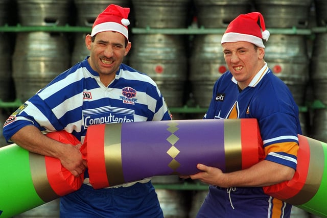Karl Harrison (left) and Nick Fozzard get ready for the Christmas cracker between Halifax and Leeds RL.