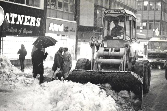 A strange sight for Blackpool when a bulldozer cleared a path for cars in the Town Centre, 1981