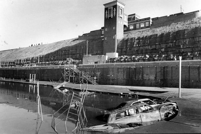 North Shore Lift in 1983 and a derelict boating pool, complete with a couple of cars...