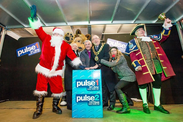 Santa along with Terry the Terrier, Dewsbury Mayoress Susan Bedford, Bishop Jonathan Gibb, Mayor of Dewsbury Paul Kane, Jacqui Blay of Pulse and Vic Watson, Huddersfield Town Crier, switch on the lights in Dewsbury in 2015