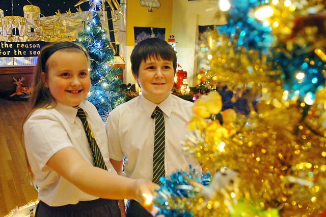 Back in 2010,  Shakespeare Primary School pupils Natasha Howell and Teddy Briggs admired the trees.