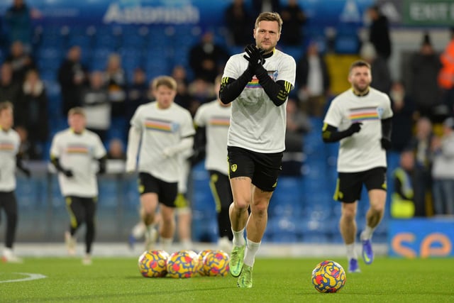 Captain Liam Cooper leads the team out to warm up in t-shirts which promote the Premier League's Rainbow Laces campaign.