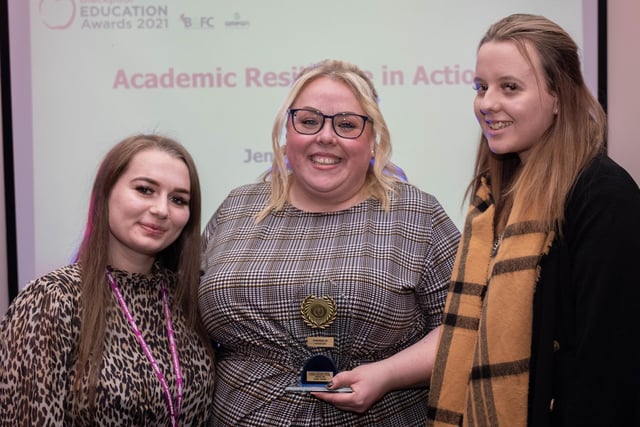 Jemma Orange of Lotus School (centre) receives the Academic Resilience in Actions Award from Daniell Aoslin and Hannah Eaglestone of Headstart.