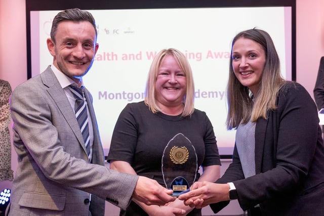 Blackpool Transport Stakeholder and Customer Experience manager Vicky Clegg (right) present Montgomery Academy with the Health and Wellbeing Award.