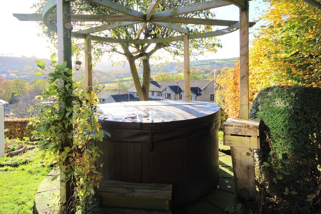 This hot tub is installed within the garden.