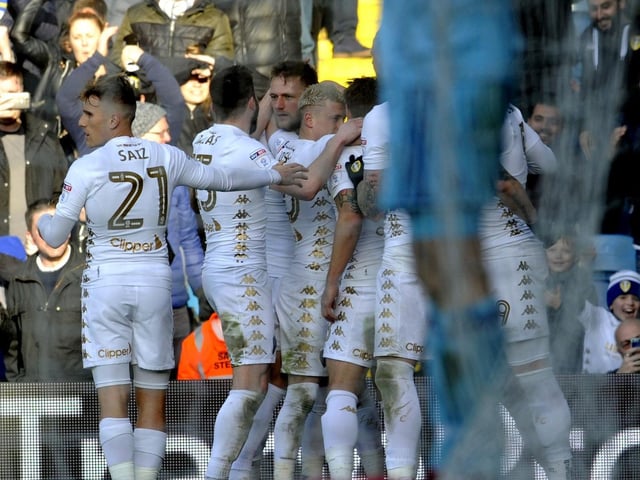 Liam Cooper is congratulated by his teammates after scoring.