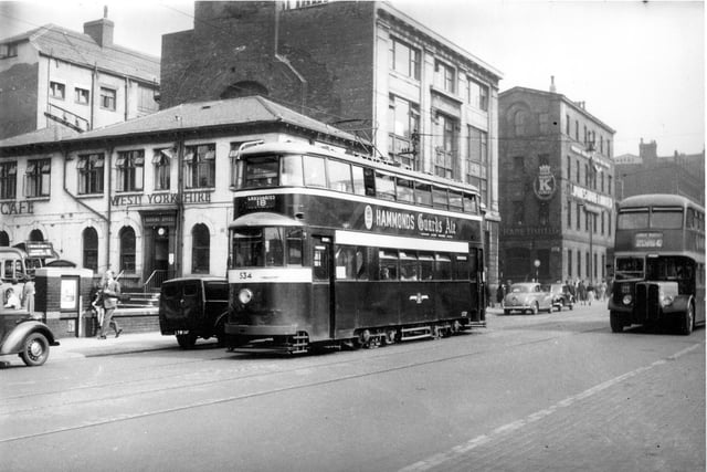 Wellington Street in September 1954. Pictured is a tram on route 534 on route 18 to Cross Gates.
