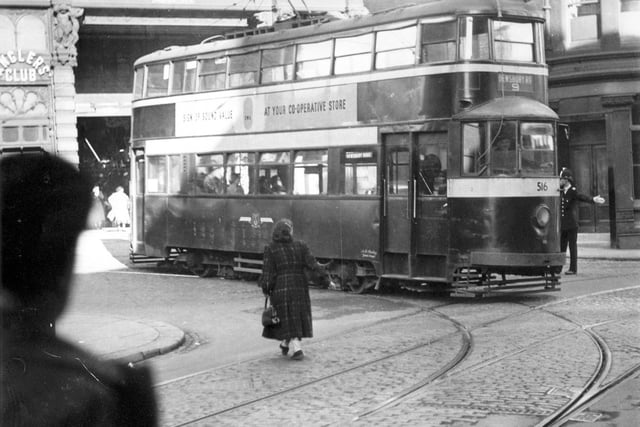 Tram no 516 pictured on Kirkgate on route no 9 to Dewsbury Road in October 1954. It has been noted on the photograph that view was taken in connection with burst water main.