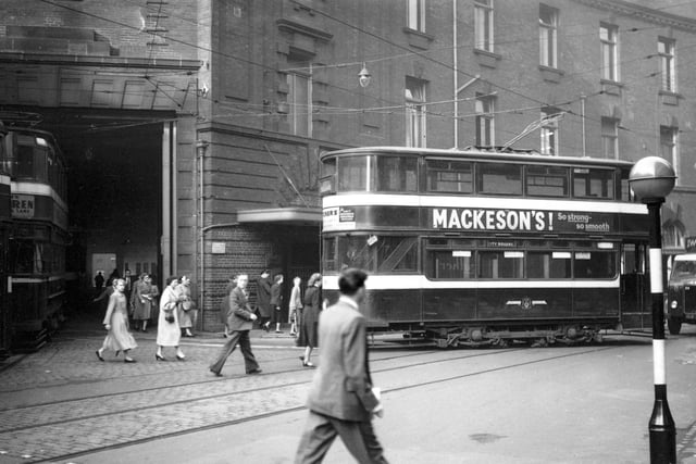 Tram no 199 is pictured entering the tram depot on Swinegate in September 1954.