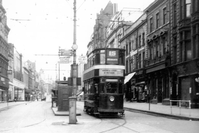 Tram No 147 travelling along Briggate on route 15 Whingate in Auguust 1954.