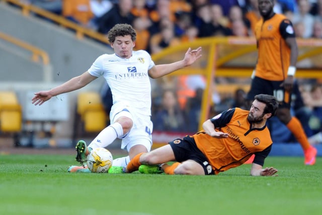 Phillips challenges Wolves' Jack Price in April 2015.